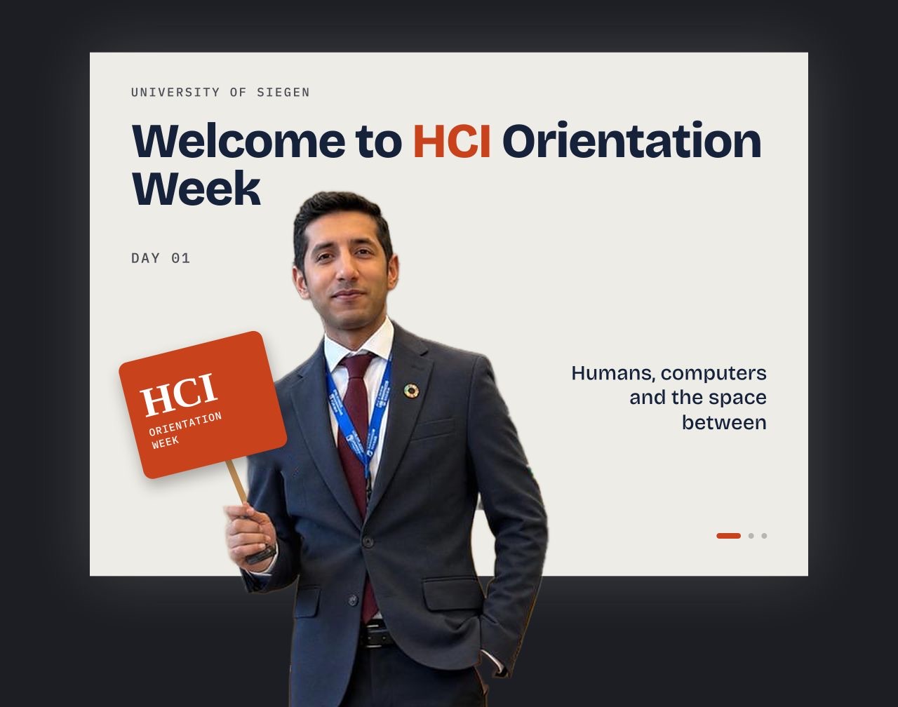 Faizan holding an HCI Orientation Week sign in front of a slide reading 'Welcome to HCI Orientation Week'